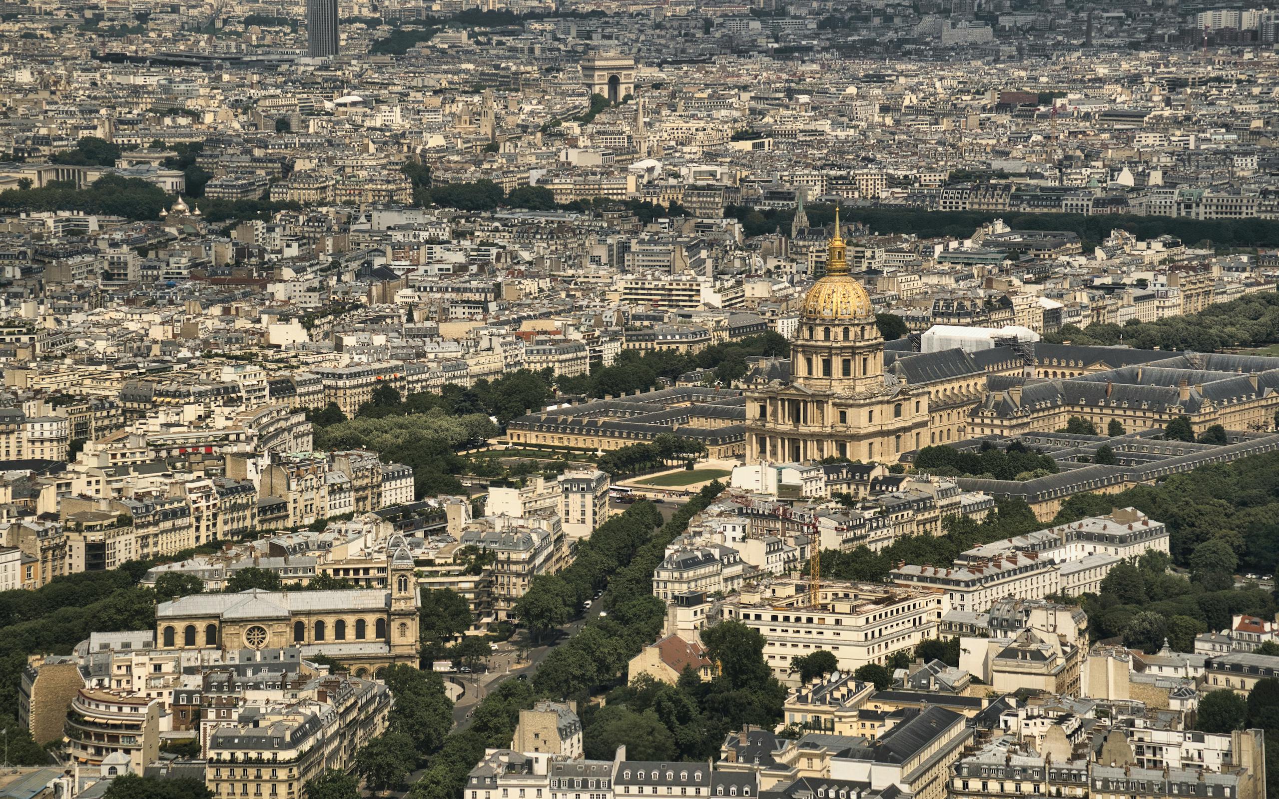 A breathtaking aerial view of Les Invalides and Paris cityscape.